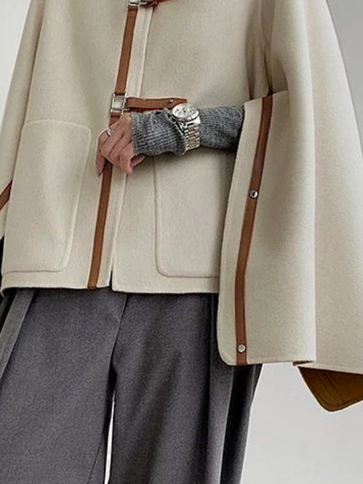 Ropa de abrigo de cuello alto con hebilla suelta y manga larga