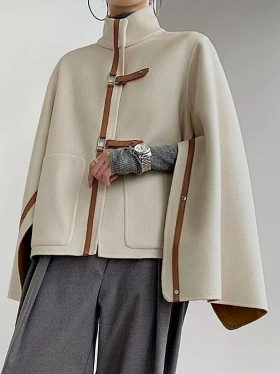 Ropa de abrigo de cuello alto con hebilla suelta y manga larga